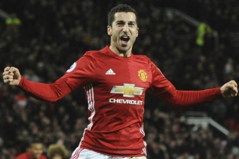 Manchester United's Henrikh Mkhitaryan celebrates after scoring his side's third goal during the English Premier League soccer match between Manchester United and Sunderland at Old Trafford in Manchester, England, Monday, Dec. 26, 2016. (AP Photo/Rui Vieira)