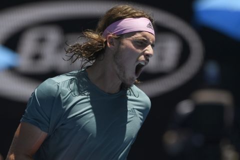 Greece's Stefanos Tsitsipas reacts after winning a point against Spain's Roberto Bautista Agut during their quarterfinal match at the Australian Open tennis championships in Melbourne, Australia, Tuesday, Jan. 22, 2019. (AP Photo/Andy Brownbill)