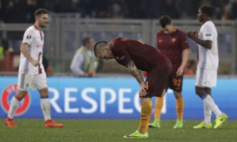 Roma's Radja Nainggolan reacts after the Europa League round of 16 second leg soccer match between Roma and Lyon, in Rome's Olympic stadium, Thursday, March 16, 2017. (AP Photo/Andrew Medichini)