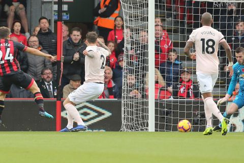 Manchester United goalkeeper David de Gea saves a shot from Bournemouth's Ryan Fraser during the Premier League soccer match between Bournemouth and Manchester United at The Vitality Stadium, Bournemouth, England. Saturday Nov. 3, 2018. (Mark Kerton/PA via AP)
