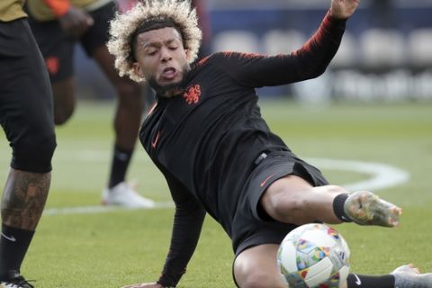Netherlands' Tonny Vilhena kicks the ball during a training session at the D. Afonson Henriques stadium in Guimaraes, Portugal, Wednesday, June 5, 2019. The Netherlands will face England Thursday in a UEFA Nations League semifinal soccer match. (AP Photo/Luis Vieira)