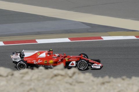 Ferrari driver Kimi Raikkonen of Finland takes a curve during the first practice session for the Bahrain Formula One Grand Prix, at the Formula One Bahrain International Circuit in Sakhir, Bahrain, Friday, April 14, 2017. The Bahrain Formula One Grand Prix will take place on Sunday. (AP Photo/Luca Bruno)