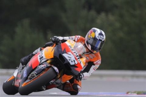 Honda rider Dani Pedrosa from Spain cuts a curve during the first free practice at the Masaryk circuit near the city of Brno, Czech Republic, Friday, Aug. 12, 2011. The Grand Prix of Czech Republic is on Sunday July 14th, 2011. (AP Photo/Jens Meyer)