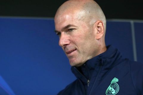 Real Madrid's head coach Zinedine Zidane attends a press conference at the team's Valdebebas training ground in Madrid, Spain, Tuesday, Feb. 25, 2020. Real Madrid will play against Manchester City in a Champions League soccer match on Wednesday. (AP Photo/Manu Fernandez)