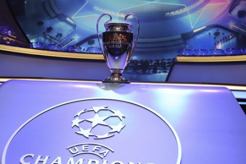 The Champions League trophy is displayed before the UEFA group stage draw at the Grimaldi Forum, in Monaco, Thursday, Aug. 29, 2019. (AP Photo/Daniel Cole)