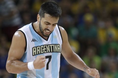 Argentina's Facundo Campazzo (7) reacts after making a basket during a basketball game against Brazil at the 2016 Summer Olympics in Rio de Janeiro, Brazil, Saturday, Aug. 13, 2016. Argentina won 111-107 in double overtime. (AP Photo/Charlie Neibergall)