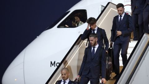 Spain's national soccer team arrives at Pashkovsky international airport in the town of Krasnodar, Russia, Thursday, June 7, 2018 to compete in the 2018 World Cup in Russia. The 21st World Cup begins on Thursday, June 14, 2018, when host Russia takes on Saudi Arabia. (AP Photo/Evgeny Reznik)