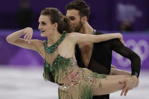 Gabriella Papadakis and Guillaume Cizeron of France perform during the ice dance, short dance figure skating in the Gangneung Ice Arena at the 2018 Winter Olympics in Gangneung, South Korea, Monday, Feb. 19, 2018. (AP Photo/Julie Jacobson)