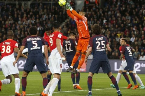 PSG's goalkeeper Alphonse Areola clears the ball during the French League One soccer match between Paris Saint Germain and Monaco at the Parc des Princes stadium in Paris, Sunday, April 15, 2018. (AP Photo/Thibault Camus)