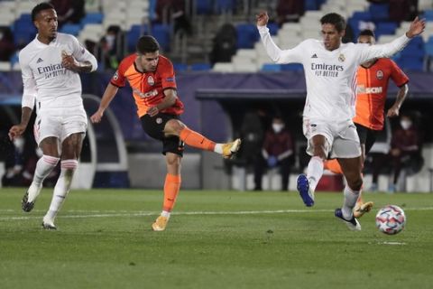 Shakhtar's Manor Solomon scores his side's third goal during the Champions League, group B soccer match between Real Madrid and Shakhtar Donetsk at Alfredo di Stefano stadium in Madrid, Spain, Wednesday, Oct. 21, 2020. (AP Photo/Manu Fernandez)