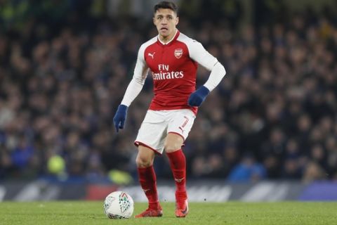 Arsenal's Alexis Sanchez during the English League Cup semifinal first leg soccer match between Chelsea and Arsenal at Stamford Bridge stadium in London, Wednesday, Jan. 10, 2018. (AP Photo/Kirsty Wigglesworth)