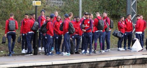 **DAILY MAIL**

England footballers wait on the platform at Lichfield Trent Valley Station prior to making their way down to London for their World Cup qualifier against Scotland at Wembley on Friday (Nov 11).  November 10, 2016. 