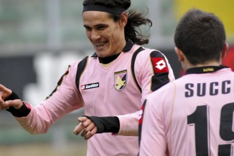 Palermo's Edison Cavani, of Uruguay, left, celebrates scoring with teammate Davide Scucci during the Italian Serie A soccer match between Palermo and  Udinese in Palermo, Italy, Sunday, Jan. 25, 2009. (AP Photo/Alessandro Fucarini)