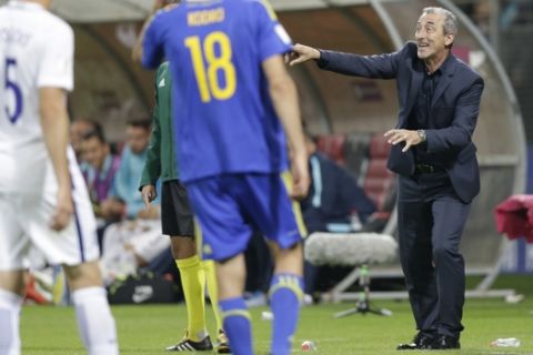 Bosnia's coach Mehmed Bazdarevic makes a point from the side of the pitch during their World Cup Group H qualifying match against Greece at the Bilino Polje Stadium in Zenica on Friday, June 9, 2017. (AP Photo/Amel Emric)
