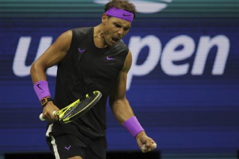 Rafael Nadal, of Spain, reacts after winning the first set against Matteo Berrettini, of Italy, during the men's singles semifinals of the U.S. Open tennis championships Friday, Sept. 6, 2019, in New York. (AP Photo/Charles Krupa)