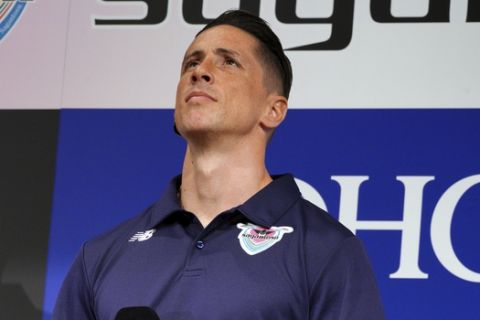 Fernando Torres pauses during a press conference in Tokyo Sunday, July 15, 2018. Former Spain striker Torres signed to play for Sagan Tosu in the J1 League last week. (AP Photo/Eugene Hoshiko)