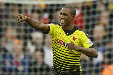 Watford's Odion Ighalo celebrates scoring his side's third goal during the English Premier League soccer match between Watford and Liverpool at Vicarage Road stadium in Watford, Sunday, Dec. 20, 2015. (AP Photo/Matt Dunham)