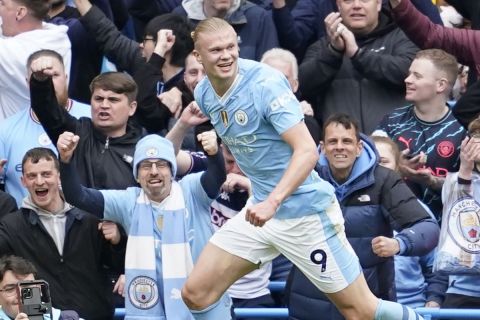 Manchester City's Erling Haaland celebrates after scoring his side's second goal during the English Premier League soccer match between Manchester City and Wolverhampton Wanderers at the Etihad Stadium in Manchester, England, Saturday, May 4, 2024. (AP Photo/Dave Thompson)