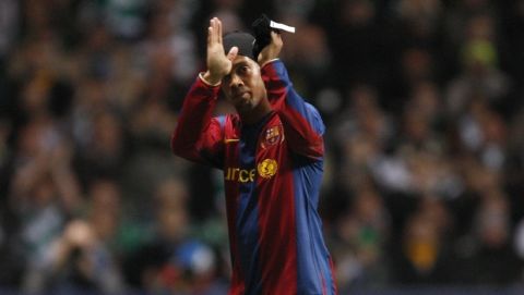 Barcelona's Ronaldinho applauds supporters as he is substituted against Celtic during their Champion's League Round of 16 soccer match at Celtic Park Stadium, Glasgow, Scotland, Wednesday Feb. 20, 2008. (AP Photo/Jon Super)