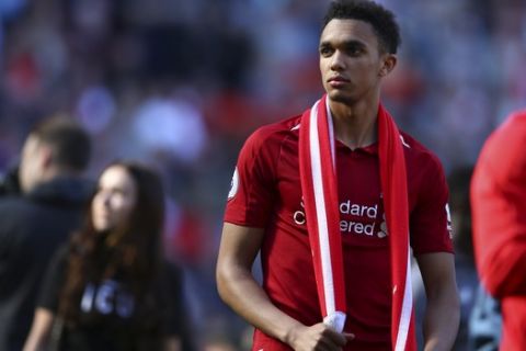 Liverpool's Trent Alexander-Arnold looks at the stands at the end of the English Premier League soccer match between Liverpool and Wolverhampton Wanderers at the Anfield stadium in Liverpool, England, Sunday, May 12, 2019. Despite a 2-0 win over Wolverhampton Wanderers, Liverpool missed out on becoming English champion for the first time since 1990 because title rival Manchester City beat Brighton 4-1. (AP Photo/Dave Thompson)