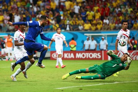 RECIFE, BRAZIL - JUNE 29: Konstantinos Mitroglou of Greece has his shot saved by Keylor Navas of Costa Rica in extra time during the 2014 FIFA World Cup Brazil Round of 16 match between Costa Rica and Greece at Arena Pernambuco on June 29, 2014 in Recife, Brazil.  (Photo by Ian Walton/Getty Images)