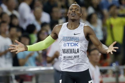 Botswana's Isaac Makwala reacts as he crosses the finish line in his men's 400m semifinal at the World Athletics Championships at the Bird's Nest stadium in Beijing, Monday, Aug. 24, 2015. (AP Photo/Kin Cheung) 
