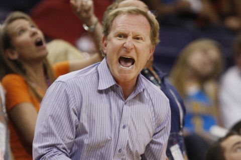Phoenix Suns majority owner Robert Sarver yells at the officials after a foul was called against the Suns during an NBA basketball game against the New Orleans Hornets Friday, March 25, 2011, in Phoenix. The Hornets defeated the Suns 106-100. (AP Photo/Ross D. Franklin)