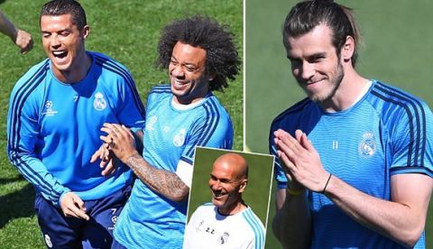 Marcelo and Cristiano Ronaldo of Real Madrid share a joke during training ahead of the UEFA Champions League Semi Final Second Leg match against Manchester City held at the Valdebebas training ground, Madrid on 3rd May 2016