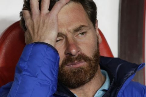 Zenit's head coach Andre Villas-Boas gestures sitting on the bench ahead of the Champions League Round of 16 first leg soccer match between Benfica and Zenit at Benfica's Luz stadium in Lisbon, Portugal, Tuesday, Feb. 16, 2016. (AP Photo/Armando Franca)