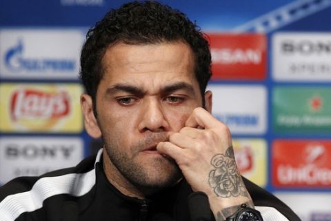 PSG's defender Dani Alves attends a press conference on the eve of the Champions League Round of 16 second leg soccer match between Paris Saint Germain and Real Madrid at the Parc des Princes stadium, in Paris, Monday, March. 5, 2018. (AP Photo/Francois Mori)