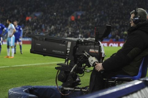 FILE - In this Monday, March 14, 2016 file photo, a view of TV camera during the English Premier League soccer match between Leicester City and Newcastle United at the King Power Stadium in Leicester, England. Television viewers in the Premier Leagues home market will get to watch a full round of games live for the first time in the first week of December, 2019. Amazon Prime bought the rights for all 10 matches this midweek and another round after Christmas as part of a three-year deal for British subscribers. (AP Photo/Rui Vieira, File)