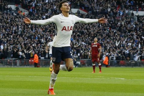 Tottenham's Dele Alli celebrates after scoring his side's third goal during the English Premier League soccer match between Tottenham Hotspur and Liverpool at Wembley Stadium in London, Sunday, Oct. 22, 2017.(AP Photo/Frank Augstein)