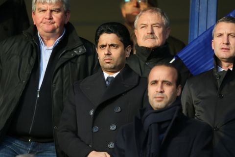 Paris Saint Germain's president Nasser Al-Khelaïfi observes a minute of silence in memory of the victims of the last Friday's Paris attacks, at the Lorient Stadium before the French League One soccer match between Lorient and Paris Saint Germain, Saturday, Nov. 21, 2015, in Lorient, western France. (AP Photo/David Vincent)