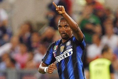 A picture taken on May 29, 2011 shows Inter Milan's Cameroonian forward Samuel Eto'o celebrates after scoring against Palermo during the Italian Cup final football match Inter Milan vs Palermo in Rome.  Samuel Eto'o has agreed terms with Anzhi Makhachkala and is on the verge of joining the ambitious southern Russian club from Inter Milan, a Russian news report said on August 11, 2011. The LifeNews.ru website said the 30-year-old had agreed the terms of his contract and would be signing the deal after passing a medical.   AFP PHOTO / MARCELLO PATERNOSTRO

