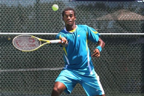 Darian King, of Barbados, returns to oppponent  Pavel Krainik, of Canada, Wednesday at the Andy Simpson Tennis Complex. No. 1 King won 6-1, 6-0. Photo by S. Paige Allen, Lewis, Lewis and Clark Community College. 
