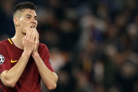 Roma's Patrik Schick reacts after missing a scoring chance during the Champions League quarterfinal second leg soccer match between Roma and FC Barcelona at Rome's Olympic Stadium, Tuesday, April 10, 2018. (AP Photo/Andrew Medichini)
