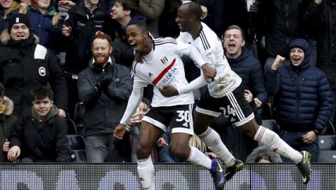 Fulham's Ryan Sessegnon celebrates scoring his side's third goal of the game with Sone Aluko, right, during the English FA Cup, Fourth Round match, Fulham vs Hull City at Craven Cottage, London, Sunday Jan. 29, 2017. (Paul Harding/PA via AP)