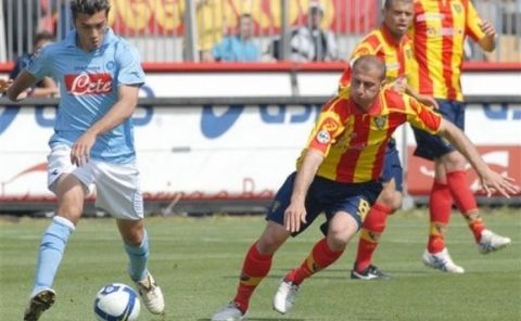 Napoli's Jesus Alberto Datolo, left, and Lecce's Dimitris Papadopoulos, in action during the Italian Serie A soccer match between Lecce and Napoli in Lecce, southern Italy, Sunday, May 10, 2009. (AP Photo/Ivan Tortorella)