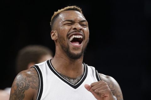 Brooklyn Nets guard Sean Kilpatrick reacts after hitting a 3-point shot against the Philadelphia 76ers during the fourth quarter of an NBA basketball game Tuesday, March 15, 2016, in New York. The Nets won 131-114. (AP Photo/Julie Jacobson)