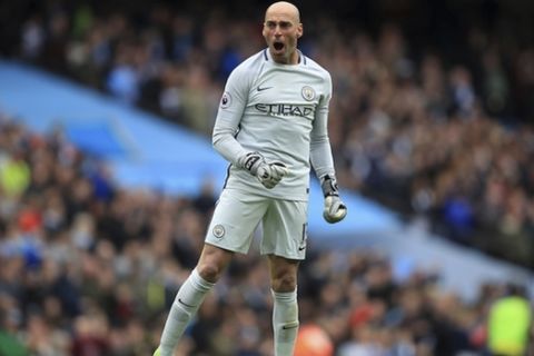 Manchester City goalkeeper Willy Caballero celebrates his side's third goal of the game scored by Kevin De Bruyne during the Premier League soccer match between Manchester City and Crystal Palace at The Etihad Stadium, Manchester, England. Saturday May 6, 2017. (Mike Egerton/PA via AP)