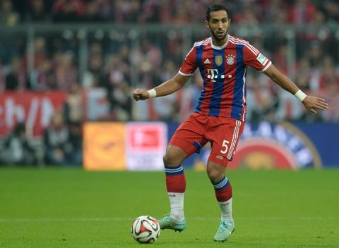 Bayern Munich's Moroccan striker Medhi Benatia  plays the ball during the German first division Bundesliga football match FC Bayern Munich vs Borussia Dortmund in Munich, southern Germany on November 1, 2014. Bayern Munich won the match 2-1. AFP PHOTO / CHRISTOF STACHE

RESTRICTIONS / EMBARGO  DFL RULES TO LIMIT THE ONLINE USAGE DURING MATCH TIME TO 15 PICTURES PER MATCH. IMAGE SEQUENCES TO SIMULATE VIDEO IS NOT ALLOWED AT ANY TIME. FOR FURTHER QUERIES PLEASE CONTACT DFL DIRECTLY AT + 49 69 650050.        (Photo credit should read CHRISTOF STACHE/AFP/Getty Images)