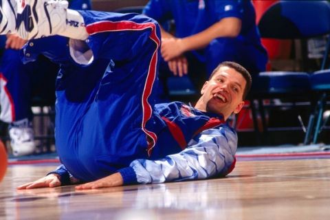 SACRAMENTO, CA - JANUARY 28: Drazen Petrovic #3 of the New Jersey Nets stretches against the Sacramento Kings on January 28, 1992 at Arco Arena in Sacramento, California. NOTE TO USER: User expressly acknowledges and agrees that, by downloading and or using this photograph, User is consenting to the terms and conditions of the Getty Images License Agreement. Mandatory Copyright Notice: Copyright 1992 NBAE (Photo by Rocky Widner/NBAE via Getty Images)