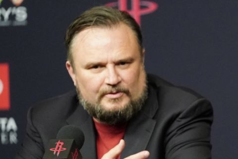 Houston Rockets General Manager Daryl Morey, left, talks about recently acquired guard Russell Westbrook, right, during a news conference, Friday, July 26, 2019, in Houston. Westbrook was acquired from the Oklahoma City Thunder. (AP Photo/David J. Phillip)