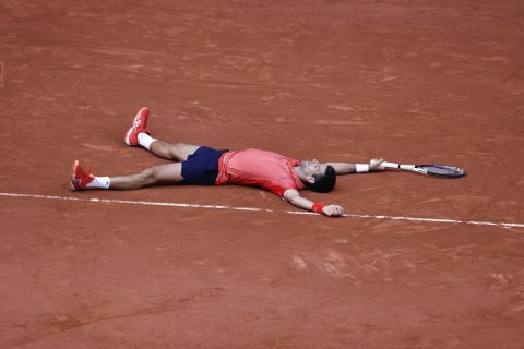 Serbia's Novak Djokovic celebrates winning the men's singles final match of the French Open tennis tournament against Norway's Casper Ruud in three sets, 7-6, (7-1), 6-3, 7-5, at the Roland Garros stadium in Paris, Sunday, June 11, 2023. Djokovic won his record 23rd Grand Slam singles title, breaking a tie with Rafael Nadal for the most by a man. (AP Photo/Jean-Francois Badias)