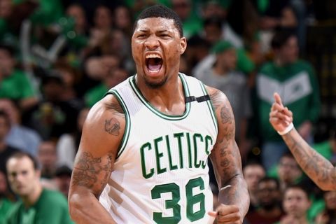 BOSTON, MA - APRIL 18:  Marcus Smart #36 of the Boston Celtics celebrates after scoring against the Chicago Bulls during Game Two of the Eastern Conference Quarterfinals of the 2017 NBA Playoffs on April 18, 2017 at TD Garden in Boston, MA. NOTE TO USER: User expressly acknowledges and agrees that, by downloading and or using this Photograph, user is consenting to the terms and conditions of the Getty Images License Agreement. Mandatory Copyright Notice: Copyright 2017 NBAE (Photo by Brian Babineau/NBAE via Getty Images)