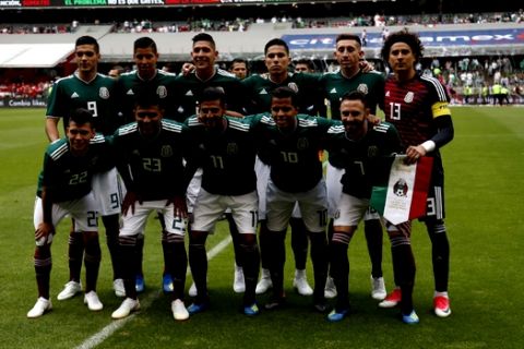 The Mexico national team poses for a group photo prior to a friendly soccer match against Scotland at Azteca Stadium in Mexico City, Saturday, June 2, 2018. (AP Photo/Eduardo Verdugo)