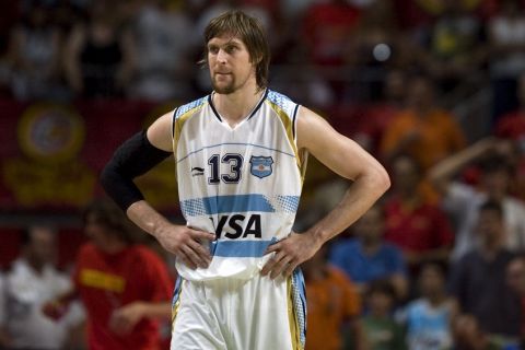 Argentina's Andres Nocioni reacts during the friendly game against Spain at the Palacio de los Deportes in Madrid, Tuesday, July 22, 2008. (AP Photo/Victor R. Caivano)