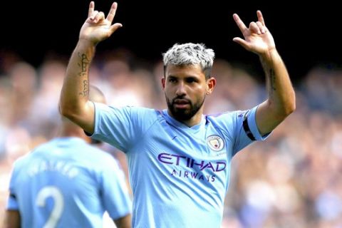 Manchester City's Sergio Aguero celebrates scoring his side's third goal of the game during the English Premier League soccer match at the Etihad Stadium, Manchester, England, Saturday Aug. 31, 2019. (Nick Potts/PA via AP)