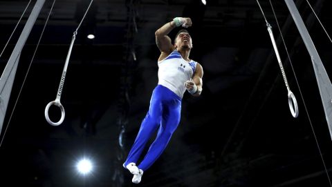 Eleftherios Petrounias of Greece performs on the rings during men's qualifying sessions for the Gymnastics World Championships in Stuttgart, Germany, Sunday, Oct. 6, 2019. (AP Photo/Matthias Schrader)