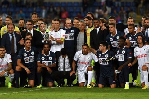 ROME, ITALY - SEPTEMBER 01:  Javier Zanetti with the trophy at the end of the Interreligious Match For Peace at Olimpico Stadium on September 1, 2014 in Rome, Italy.  (Photo by Valerio Pennicino/Getty Images)